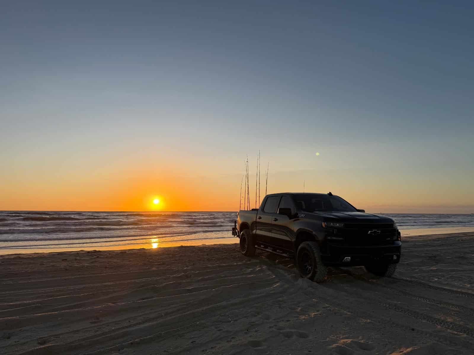 Sunrise beach driving on the Outer Banks in a Beach 4x4 rental truck